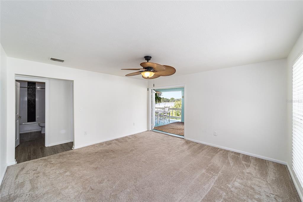 10399 Northeast 218th Lane Road Fort McCoy, FL 32134 - Photo 40 of 68 a view of a livingroom with a chandelier fan