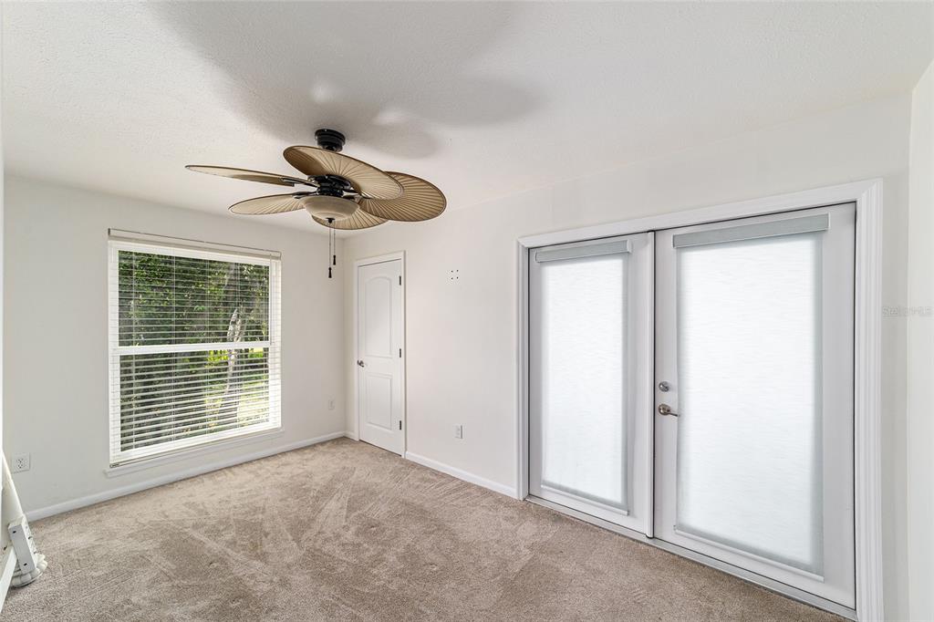 10399 Northeast 218th Lane Road Fort McCoy, FL 32134 - Photo 41 of 68 a view of an empty room with a window