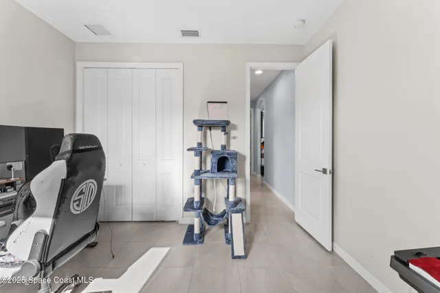 a view of a livingroom with storage & utility