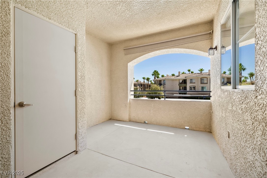 7139 South Durango Drive, Unit 203 Las Vegas, NV 89113 - Photo 20 of 25 View of balcony with storage
