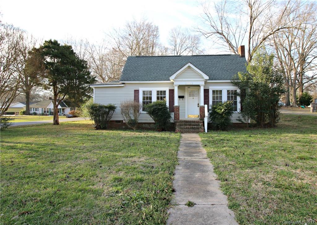 1104 Brantley Road Kannapolis, NC 28083 - Photo 1 of 14 a front view of a house with a garden