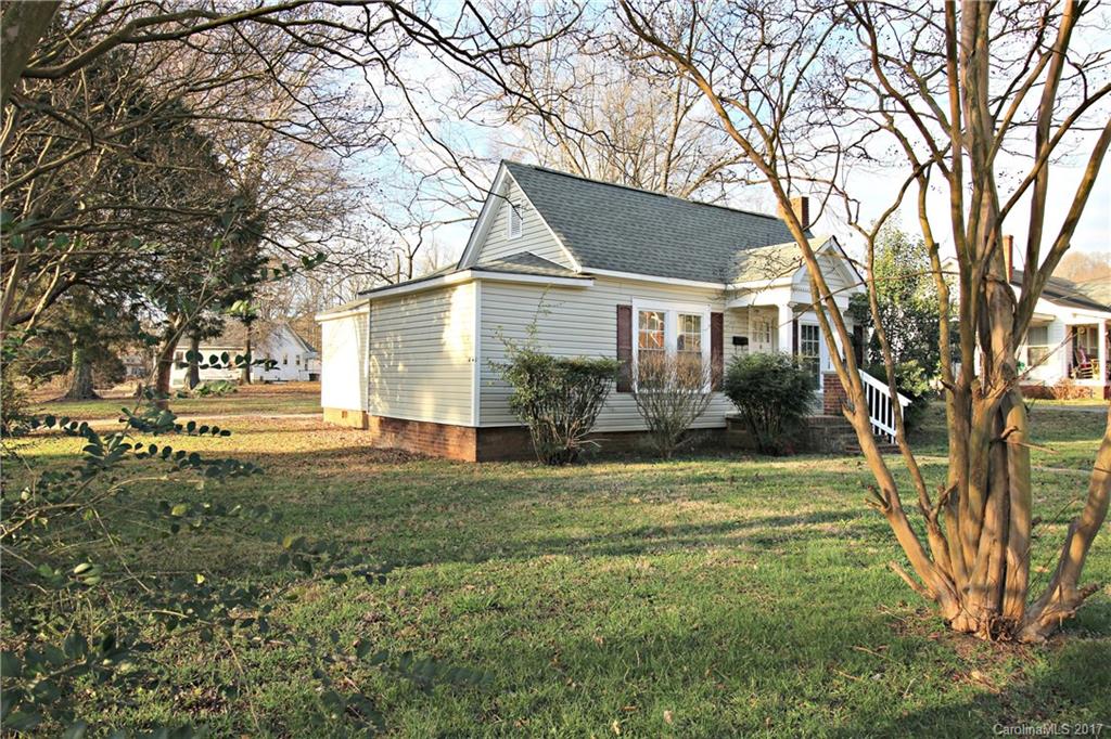 1104 Brantley Road Kannapolis, NC 28083 - Photo 2 of 14 a view of a house with a yard