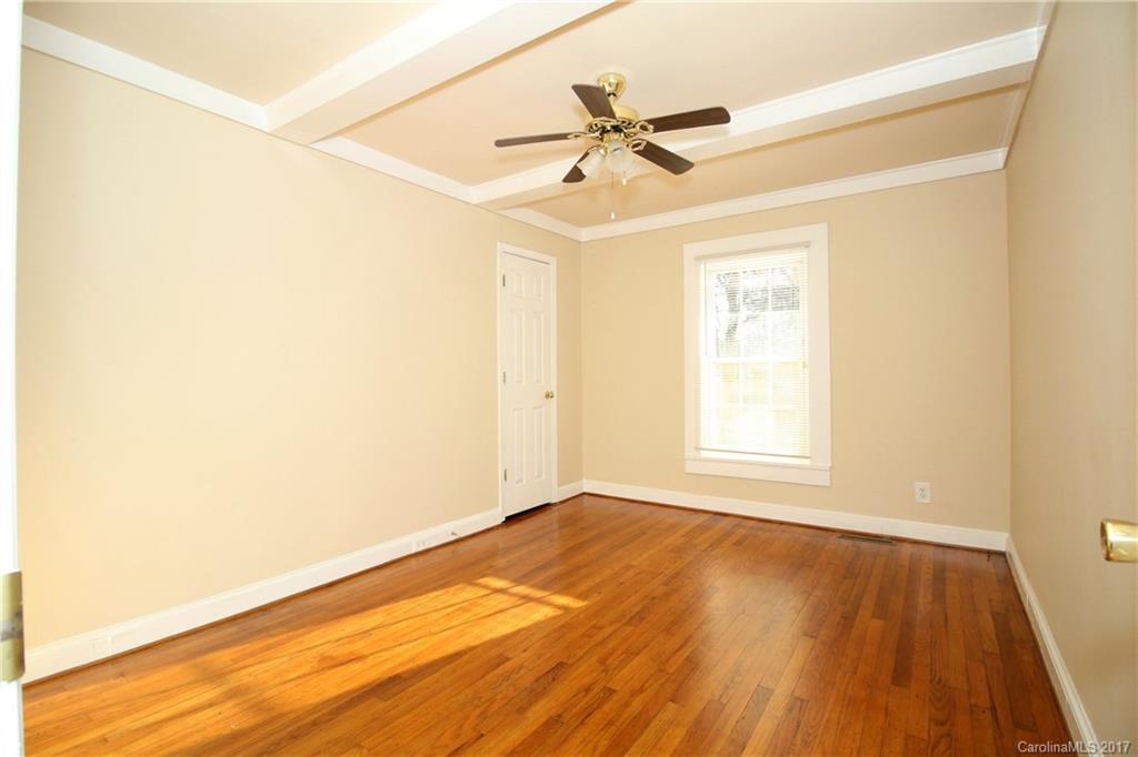 1104 Brantley Road Kannapolis, NC 28083 - Photo 11 of 14 a view of a room with wooden floor and a ceiling fan