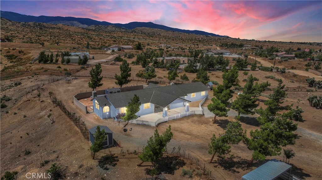 5165 Cygnet Road Phelan, CA 92371 - Photo 1 of 1 a view of a lake in middle of the forest