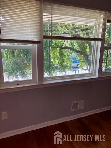 a view of a windows in an empty room
