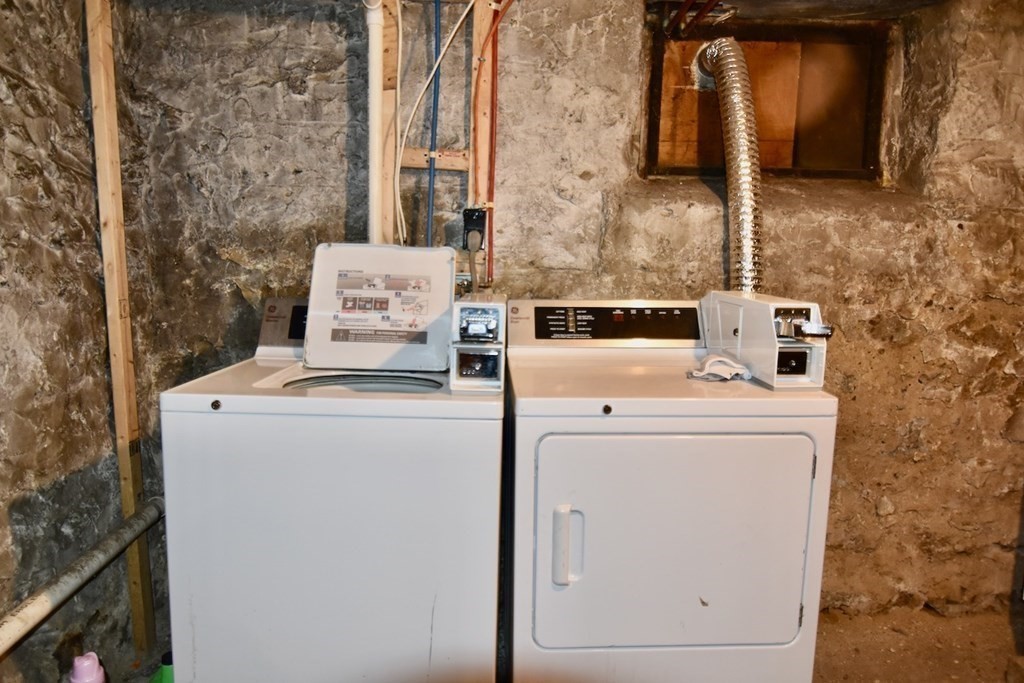 21 Treadway Road, Unit 2 Boston, MA 02125 - Photo 18 of 21 a utility room with dryer and washer