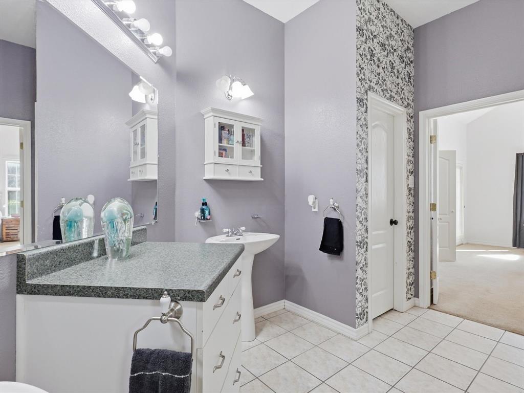 130 Parsonage Street Azle, TX 76020 - Photo 10 of 39 Bathroom featuring light tile patterned floors