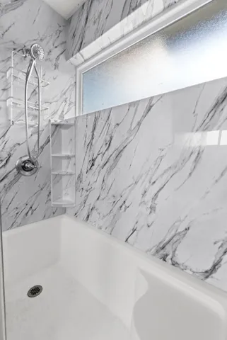 a bathroom with a bathtub