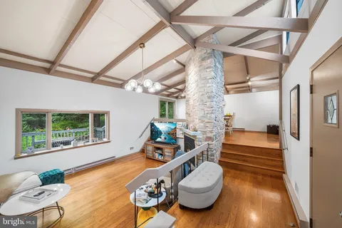 a room with furniture and a wooden floor