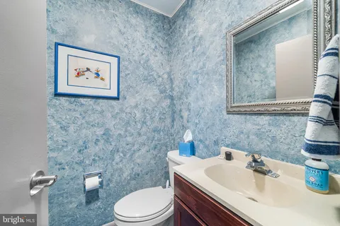 a view of a hallway with a chandelier