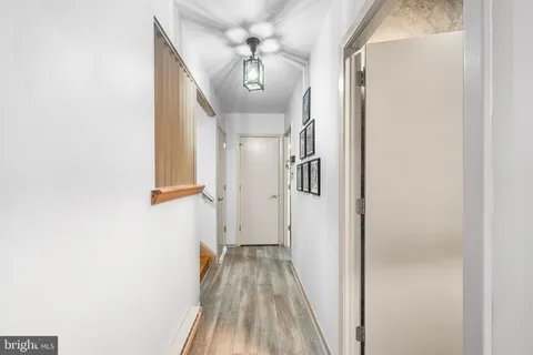 a view of a workspace with furniture