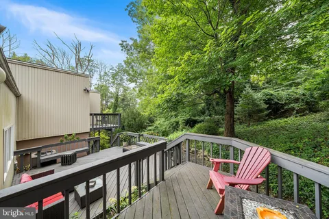 a view of balcony with furniture