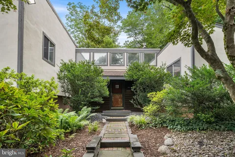 front view of a house with a street