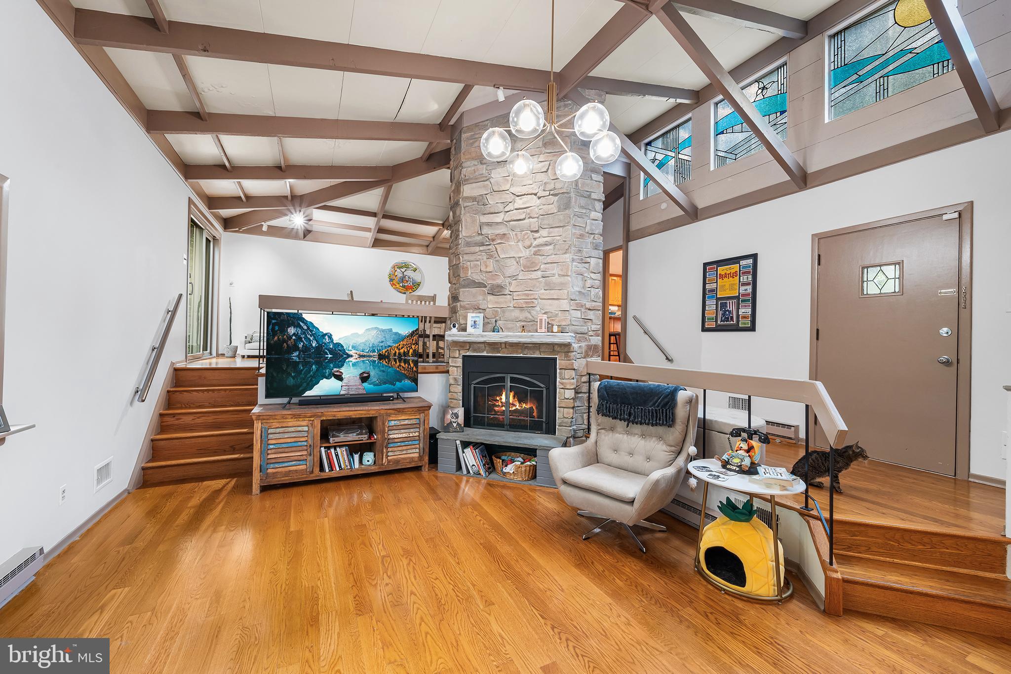 190 Pine Tree Road King of Prussia, PA 19406 - Photo 5 of 37 a living room with furniture and a fireplace