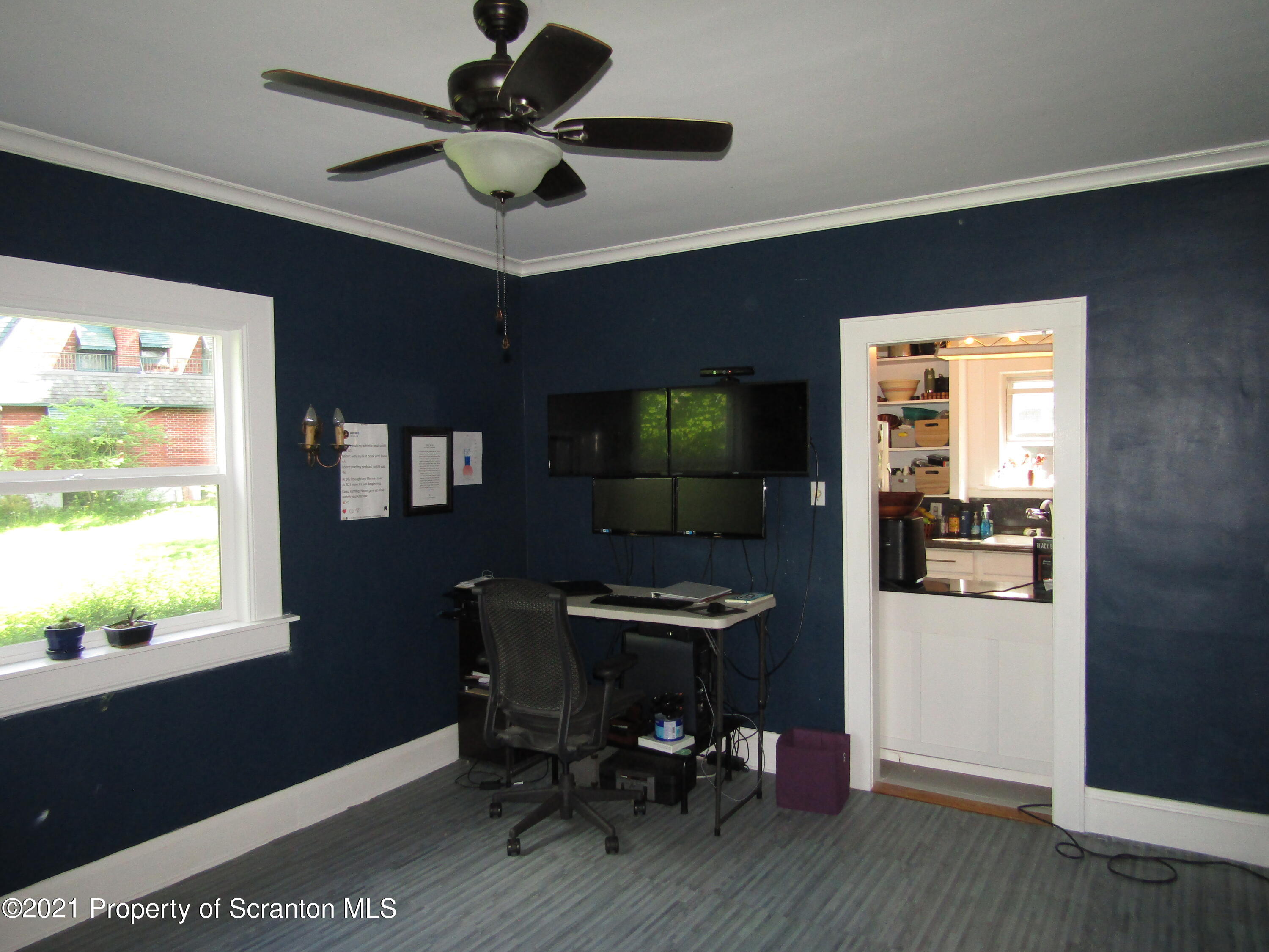 1314 State Rte 435 Moscow, PA 18444 - Photo 17 of 27 a workspace with furniture window and wooden floor