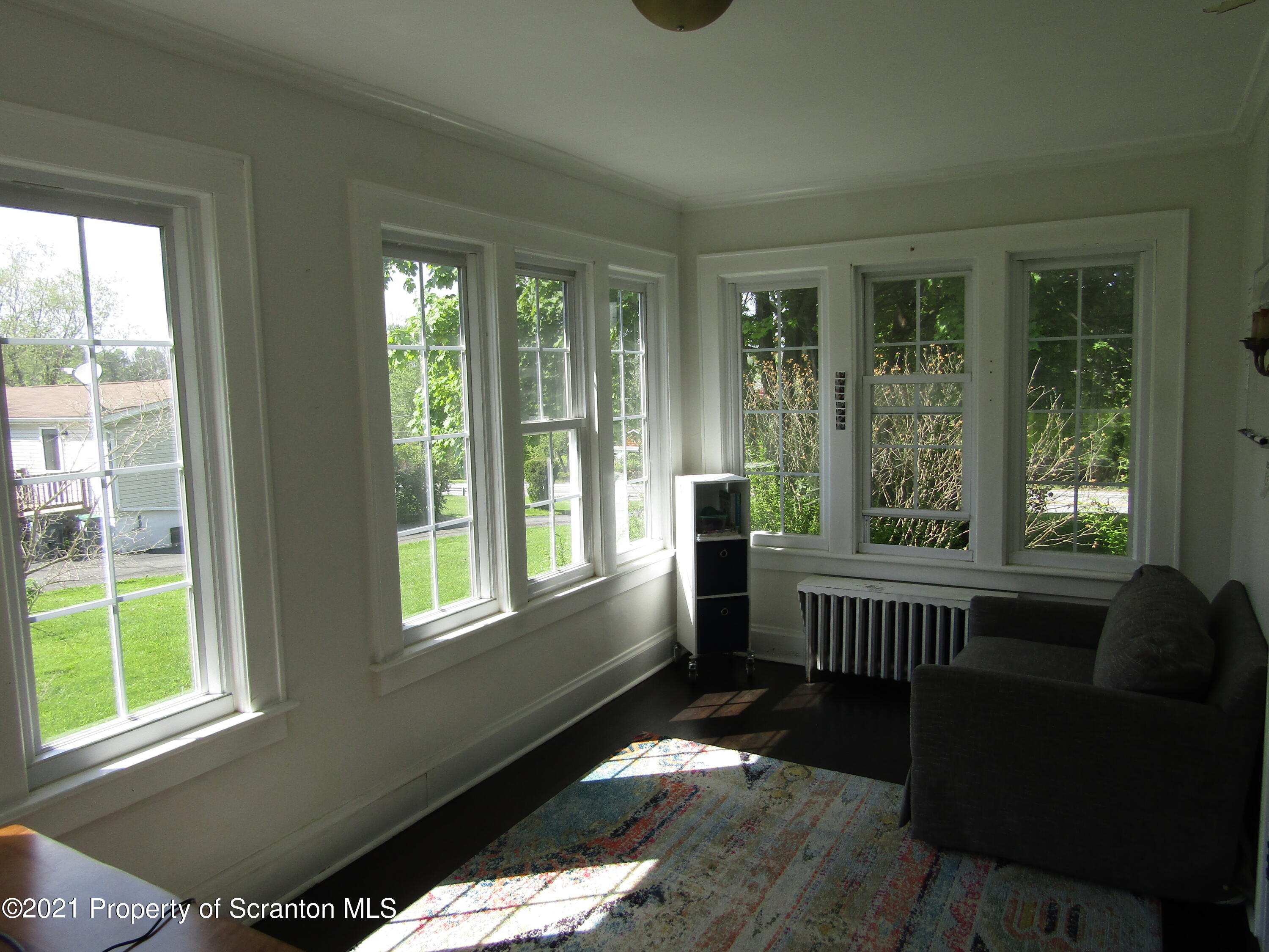 1314 State Rte 435 Moscow, PA 18444 - Photo 19 of 27 a bedroom with furniture and a window