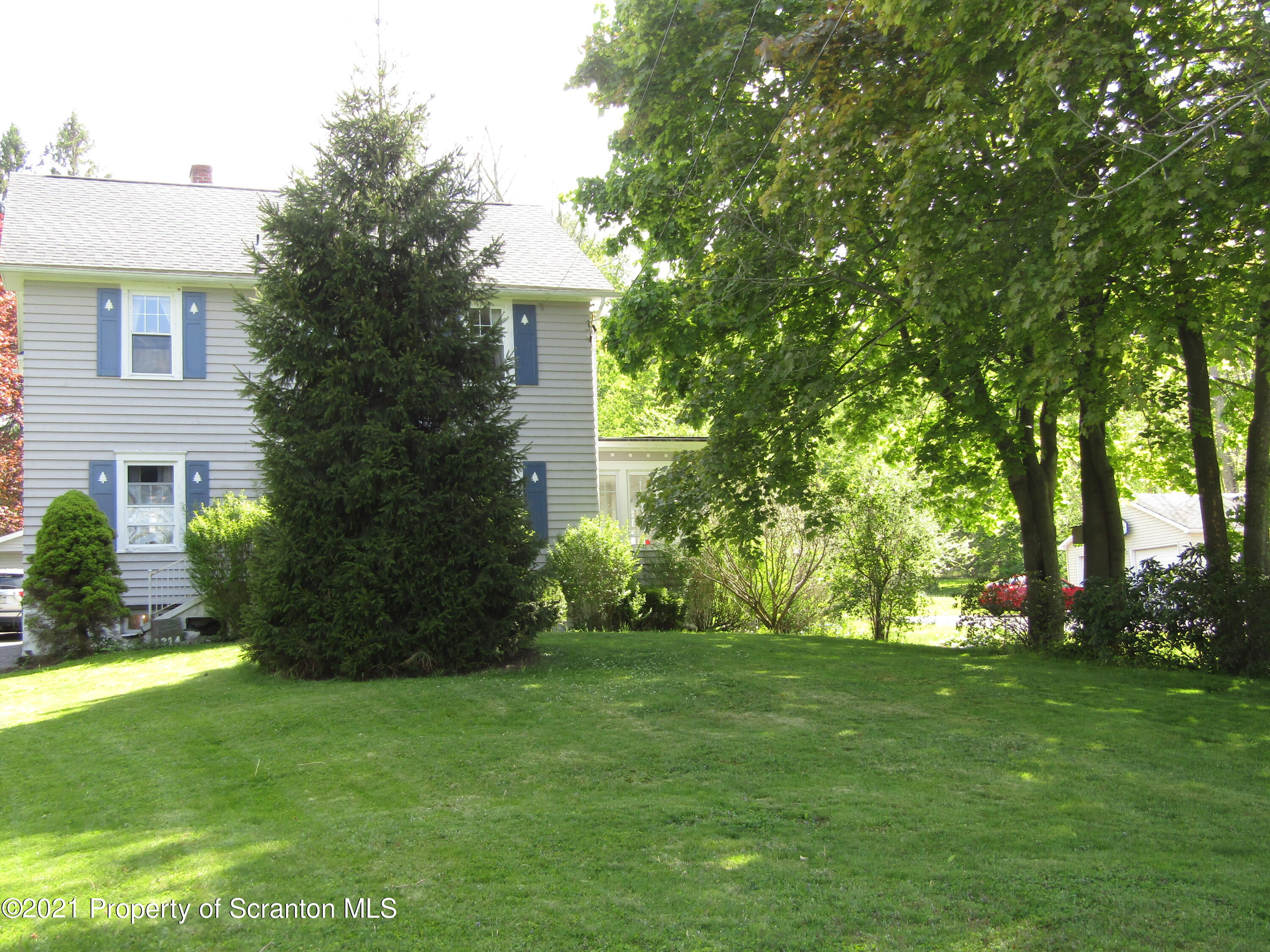 1314 State Rte 435 Moscow, PA 18444 - Photo 2 of 27 a view of a house with a yard