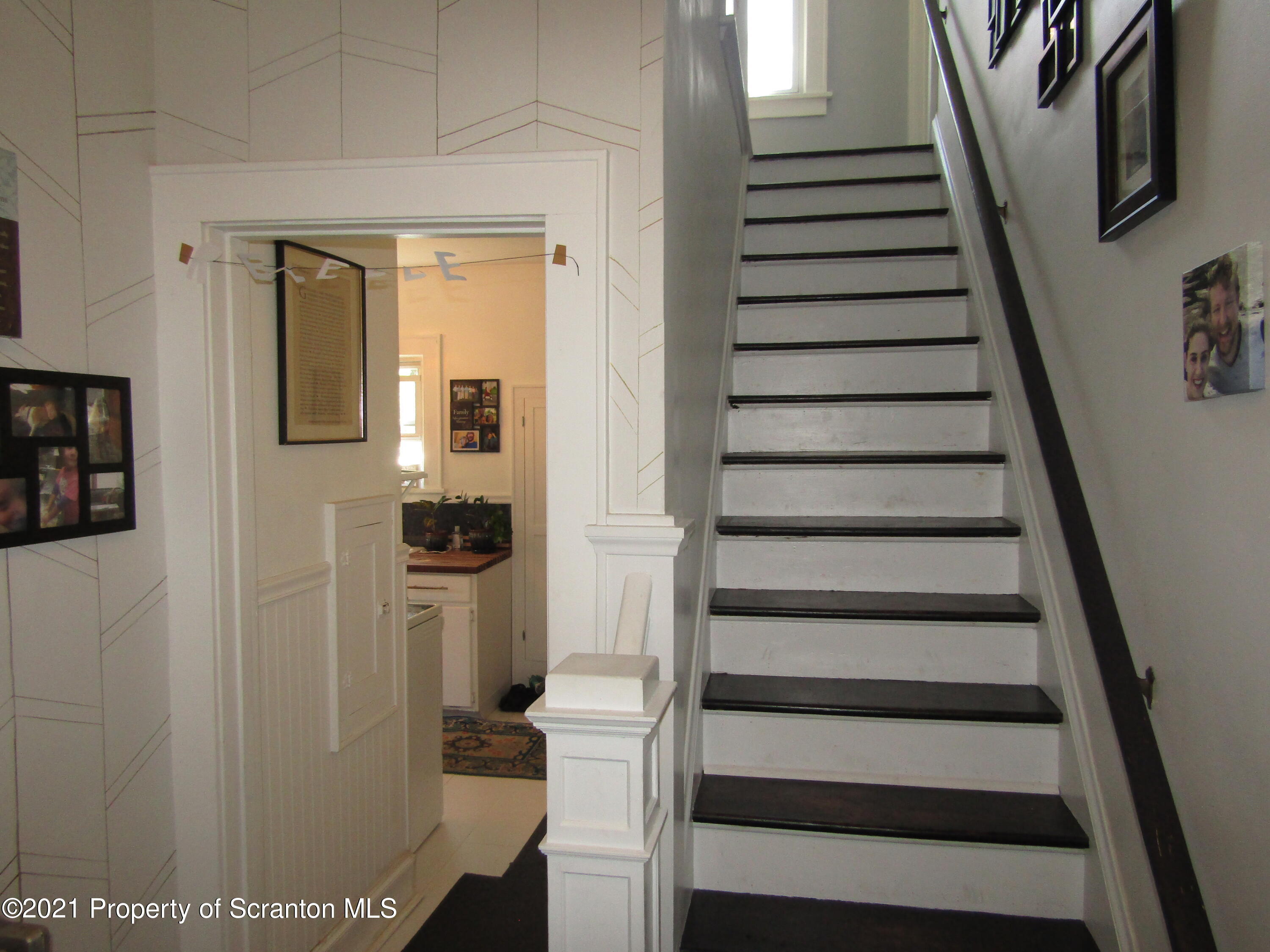 1314 State Rte 435 Moscow, PA 18444 - Photo 21 of 27 a view of entryway and hall with wooden floor