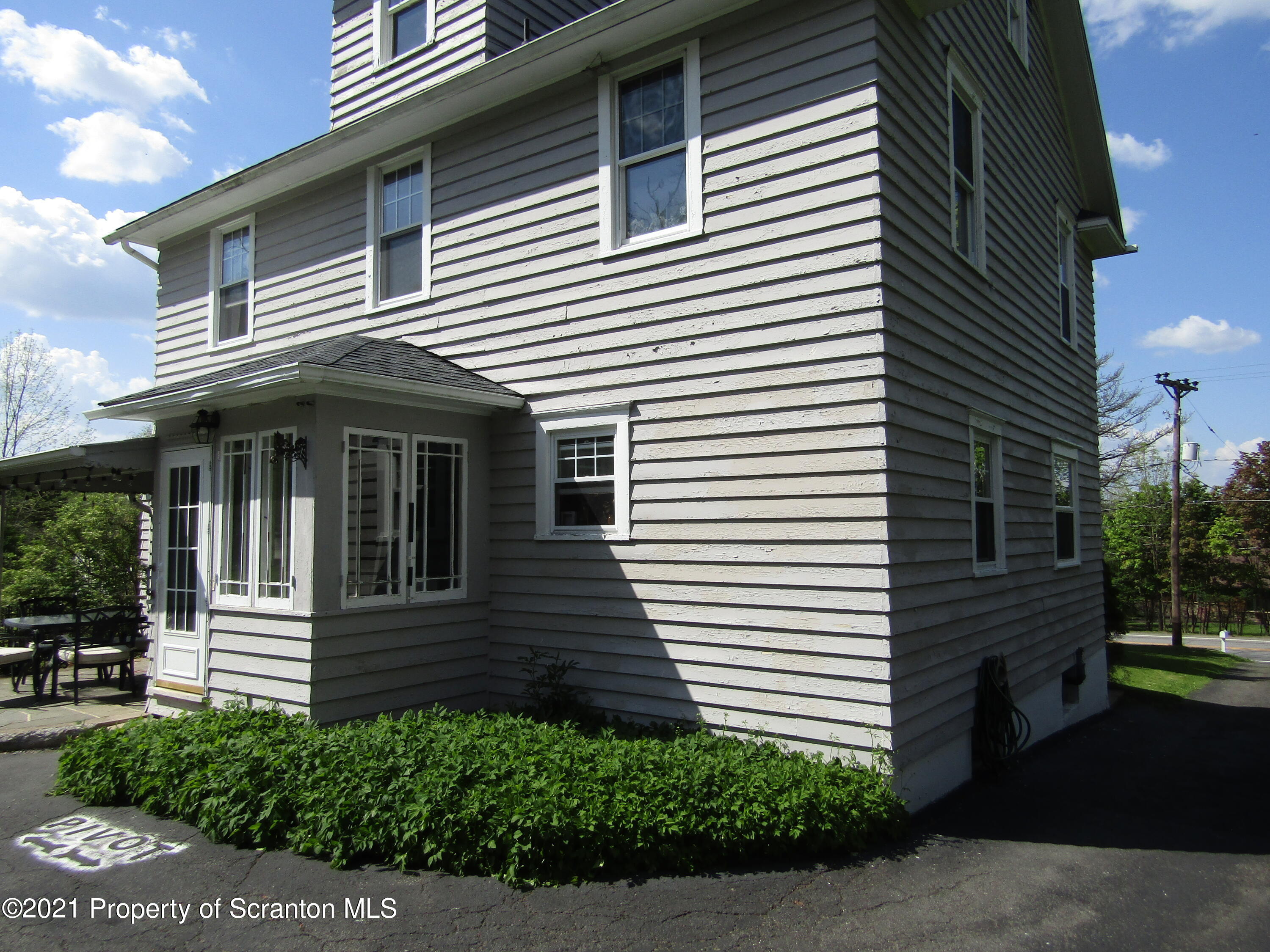 1314 State Rte 435 Moscow, PA 18444 - Photo 5 of 27 a view of a house with a yard and plants