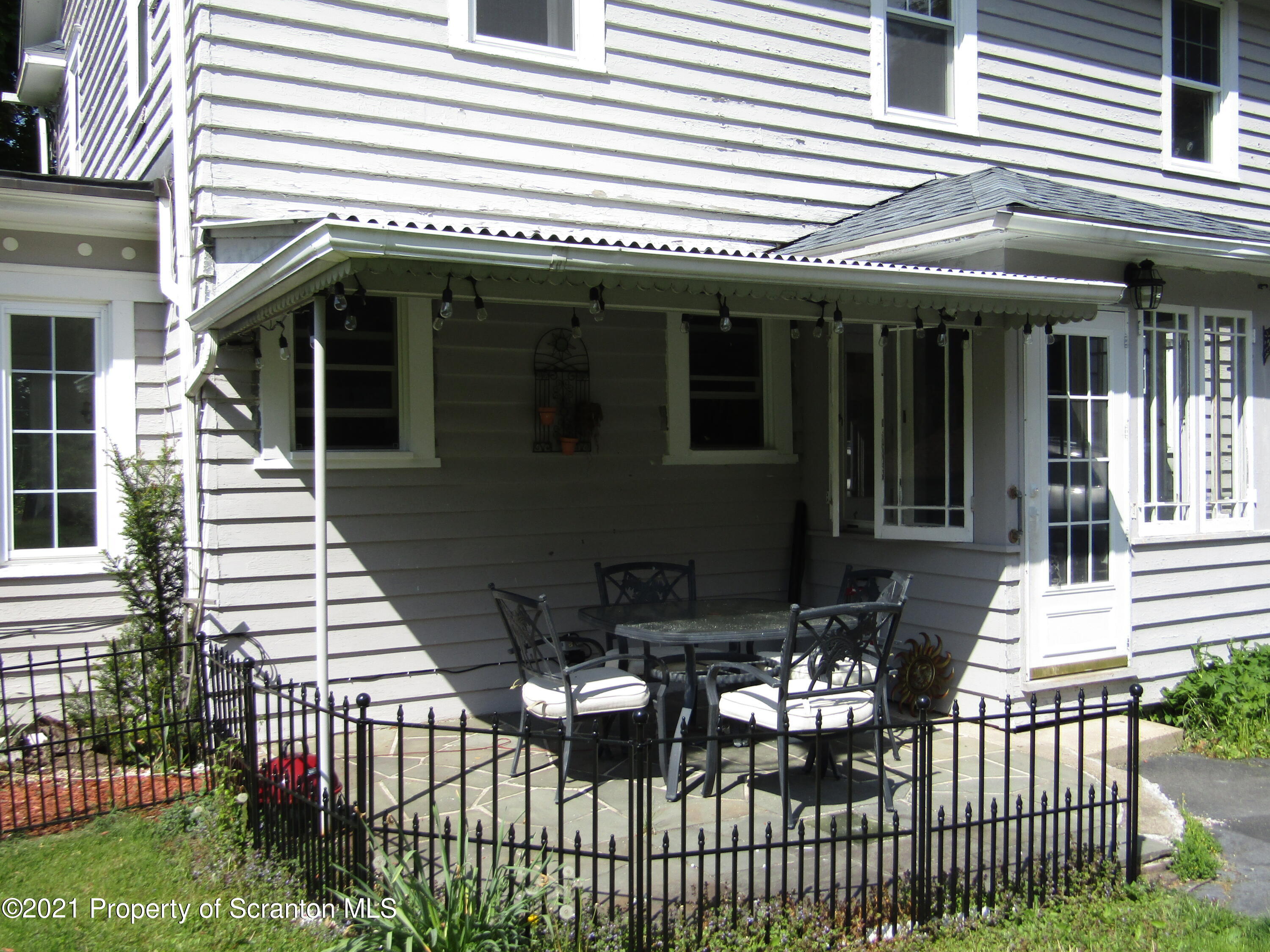 1314 State Rte 435 Moscow, PA 18444 - Photo 6 of 27 a front view of a house with a garden