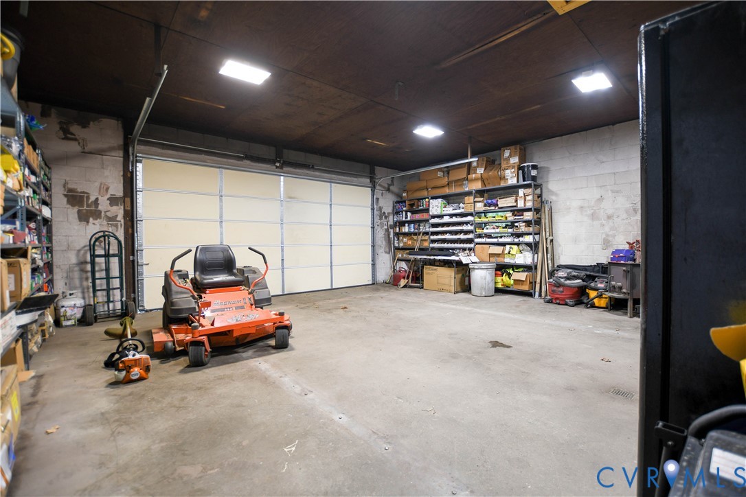 1448 Canterbury Road St. Stephens Church, VA 23148 - Photo 45 of 57 Spacious interior featuring a large overhead door,