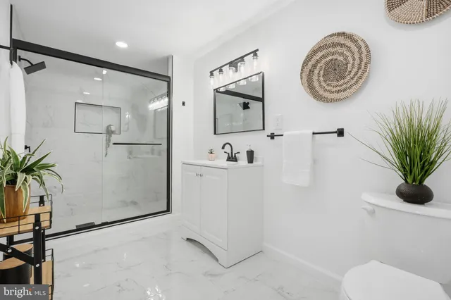 a view of a hallway with washer and dryer