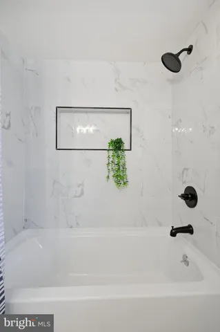 a bathroom with a bathtub