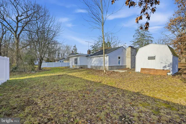 a house view with a backyard space