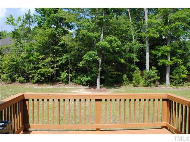 1018 Lakeview Road Durham, NC 27712 - Photo 22 of 25 a roof deck with a table and chairs