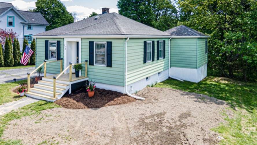 175 Maple Street Somerset, MA 02726 - Photo 18 of 25 a front view of a house with garden