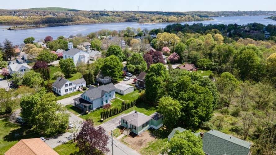 175 Maple Street Somerset, MA 02726 - Photo 19 of 25 an aerial view of a house with a yard and lake view