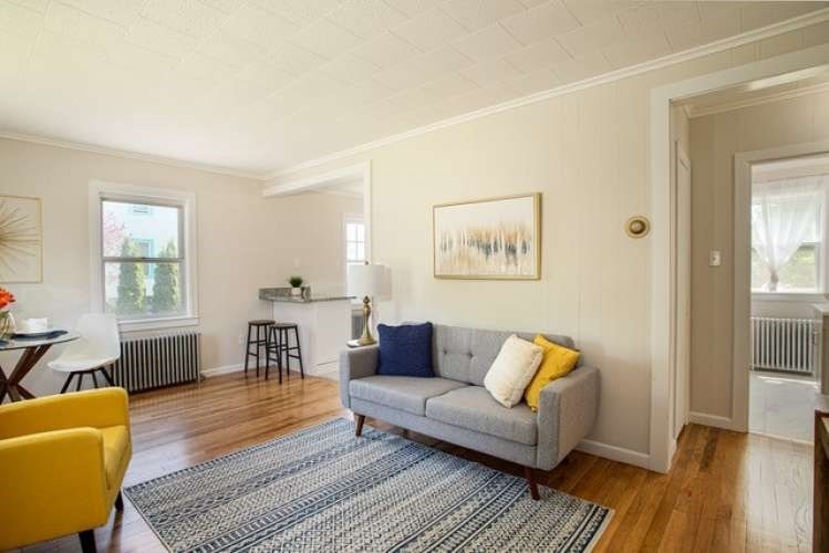 175 Maple Street Somerset, MA 02726 - Photo 7 of 25 a living room with furniture and a wooden floor