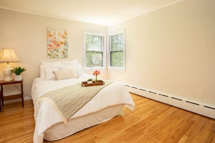 175 Maple Street Somerset, MA 02726 - Photo 10 of 25 a bedroom with a bed and a window