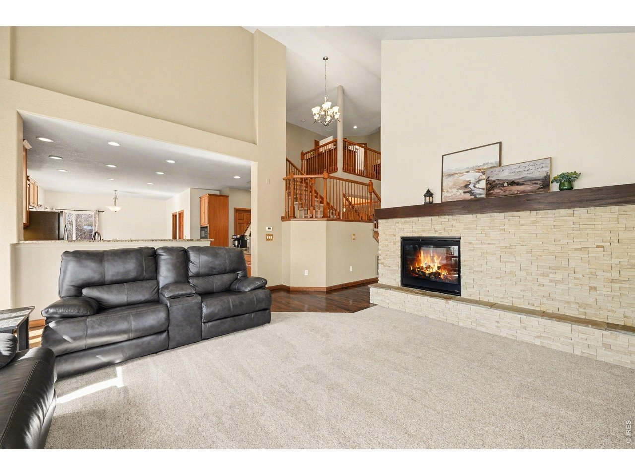 5507 Morgan Way Frederick, CO 80504 - Photo 12 of 45 a living room with furniture and a fireplace