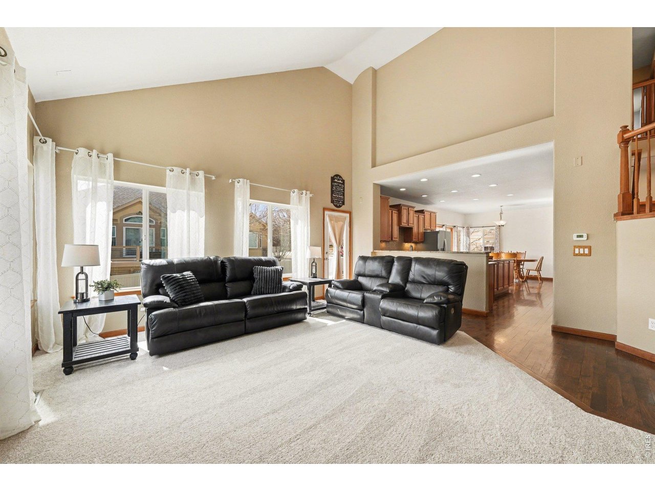 5507 Morgan Way Frederick, CO 80504 - Photo 13 of 45 a living room with furniture and a table