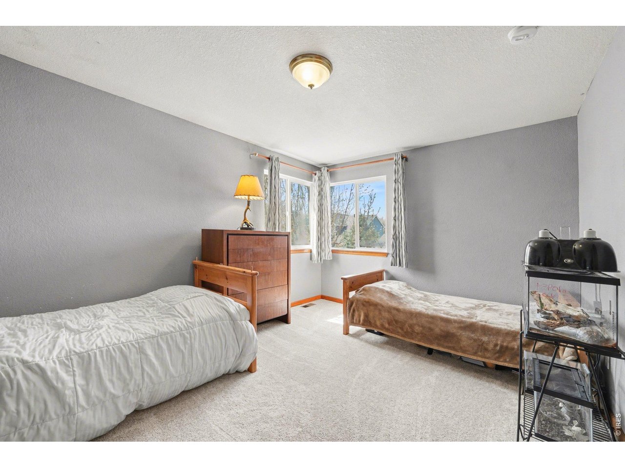 5507 Morgan Way Frederick, CO 80504 - Photo 31 of 45 a bedroom with a bed and window