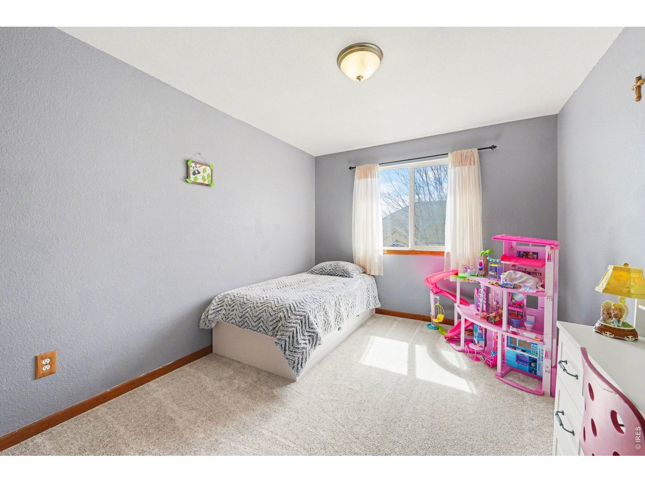 5507 Morgan Way Frederick, CO 80504 - Photo 33 of 45 a bedroom with a bed and a window