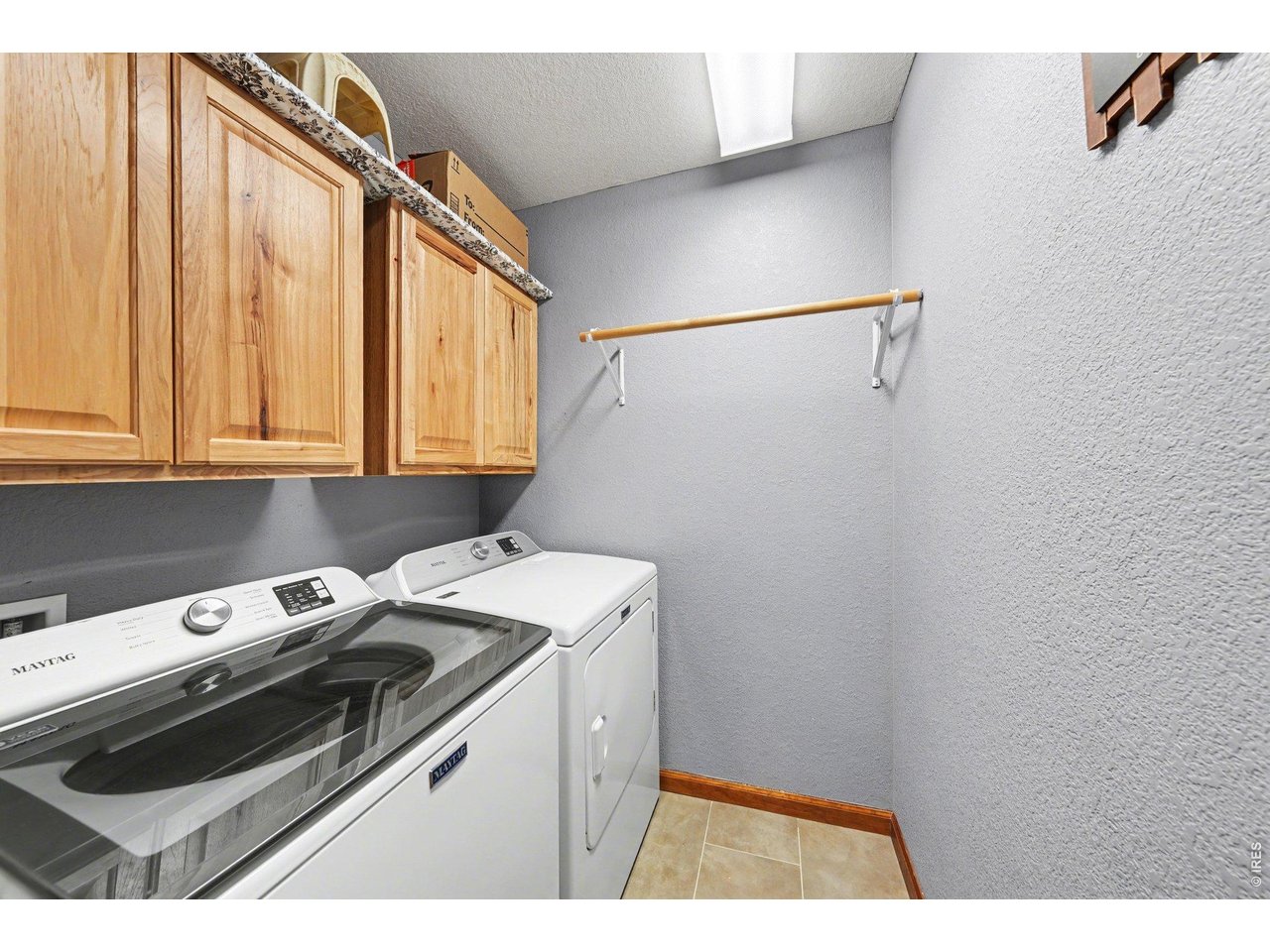 5507 Morgan Way Frederick, CO 80504 - Photo 34 of 45 a utility room with dryer and washer