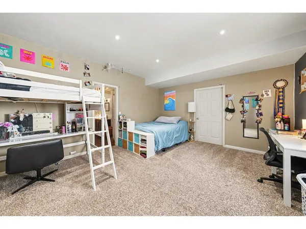 a bed room with a bed and a walk in closet