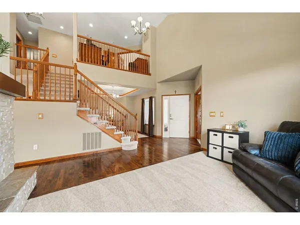 a view of livingroom and dining room with furniture