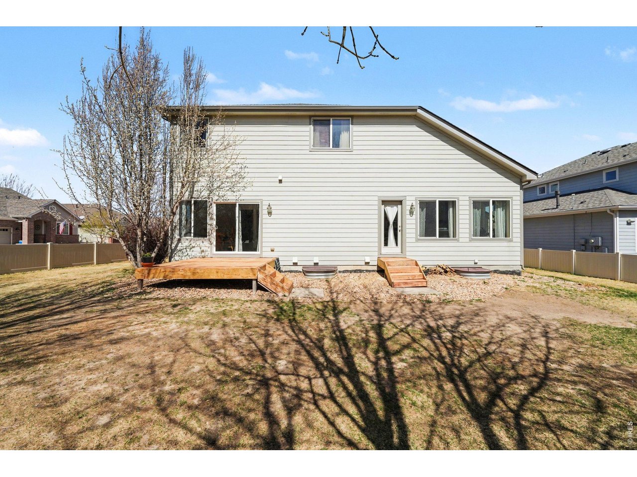 5507 Morgan Way Frederick, CO 80504 - Photo 44 of 45 a view of a house with a yard