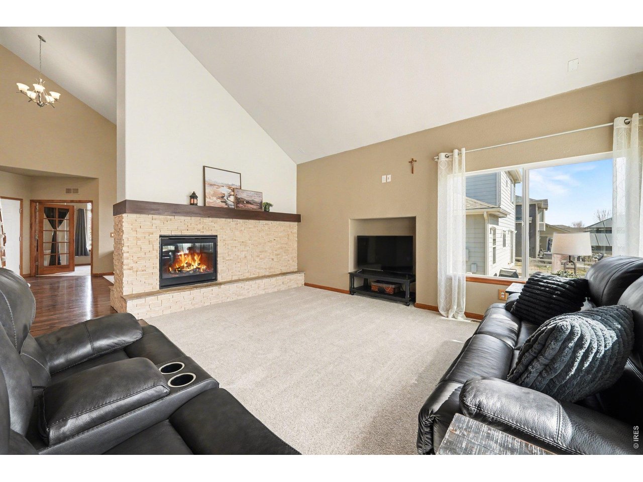 5507 Morgan Way Frederick, CO 80504 - Photo 10 of 45 a living room with furniture and a fireplace