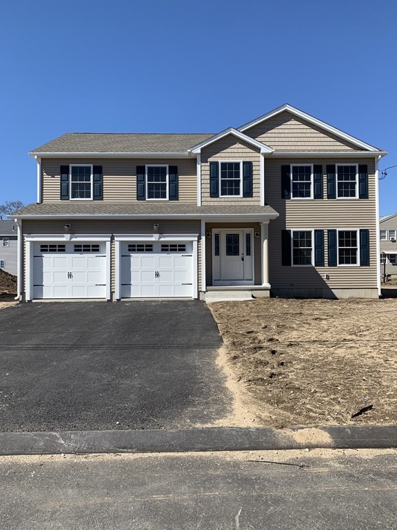 290 Gilbert Avenue Springfield, MA 01119 - Photo 1 of 1 a front view of a house with a yard