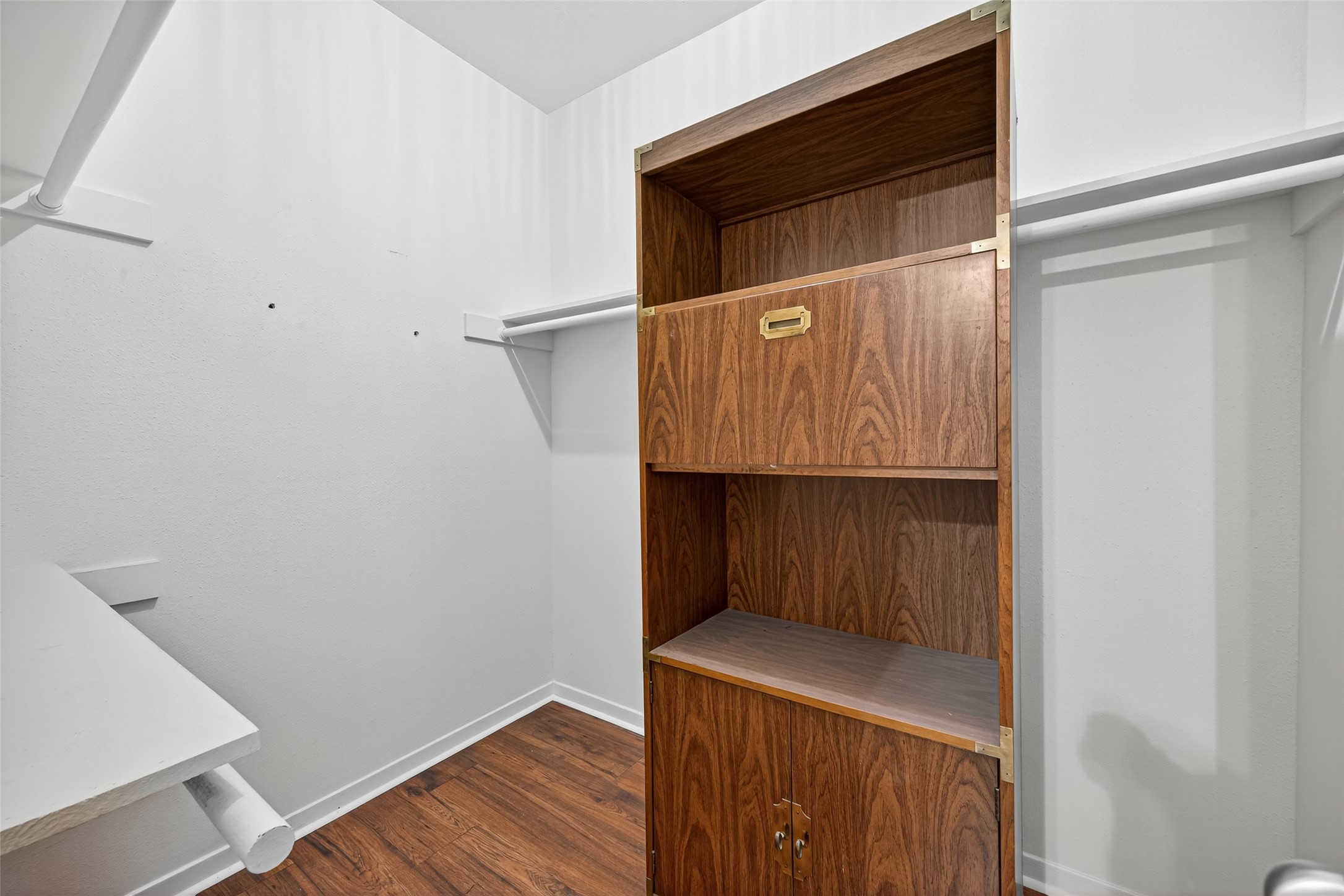 4041 Drake Street, Unit 203 Houston, TX 77005 - Photo 15 of 26 a hallway with washer and dryer