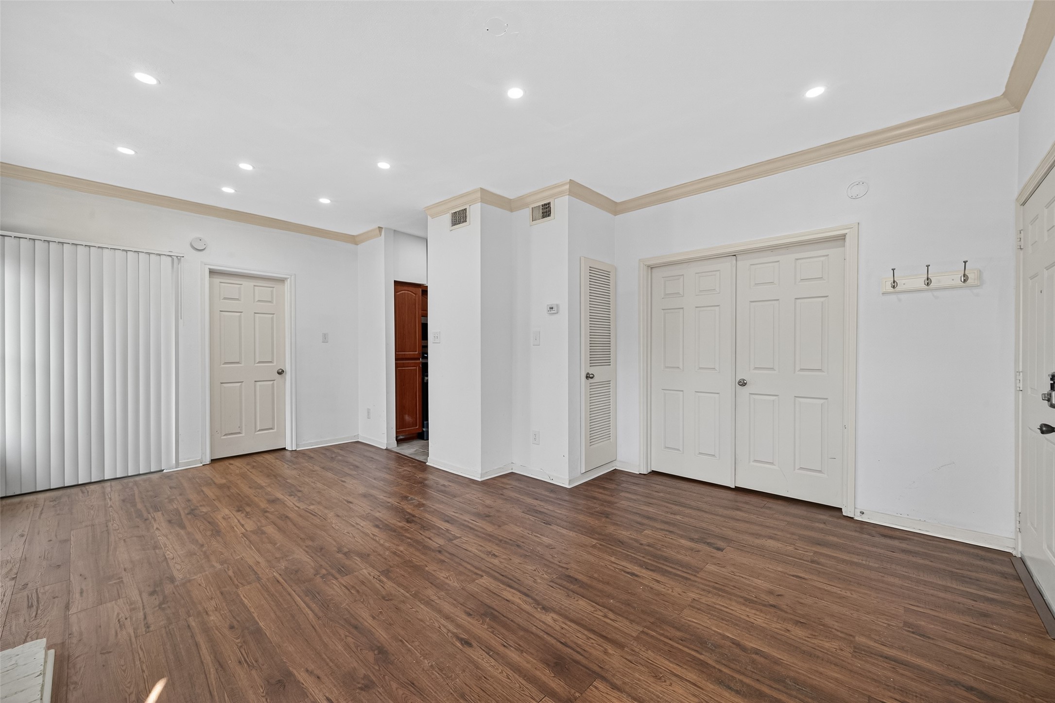 4041 Drake Street, Unit 203 Houston, TX 77005 - Photo 7 of 26 a view of a livingroom with wooden floor