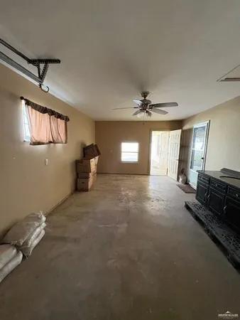 a view of empty room with windows