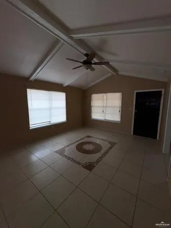 a view of a livingroom with a staircase