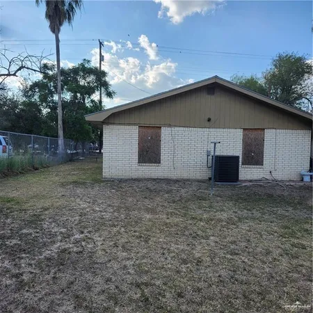 a house with a yard and garage