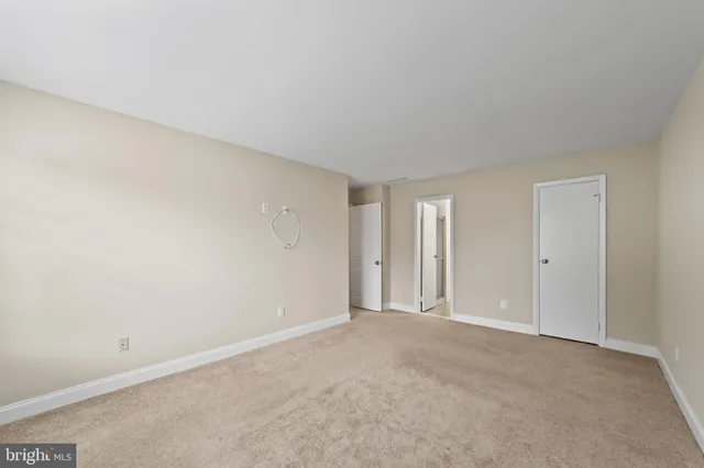 a view of an empty room and window