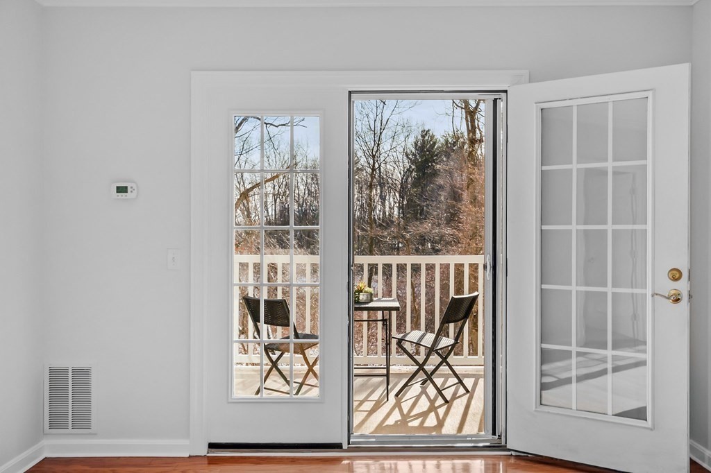190 Chickering Road, Unit 208D North Andover, MA 01845 - Photo 13 of 42 an outdoor view of house with wooden floor and a window